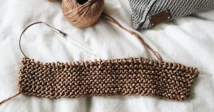 brown and white knit textile